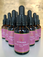 Multiple bottles of Pūraka Face Oil Serum Rose in amber glass dropper bottles, handmade in small batches in the United Kingdom