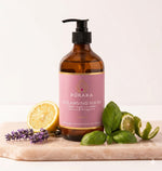 Pūraka Cleansing Wash bottle with lemon, basil, lavender and bergamot on blush stone