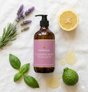 Pūraka Cleansing Wash flatlay with lavender, lemon, sweet basil and bergamot on white linen